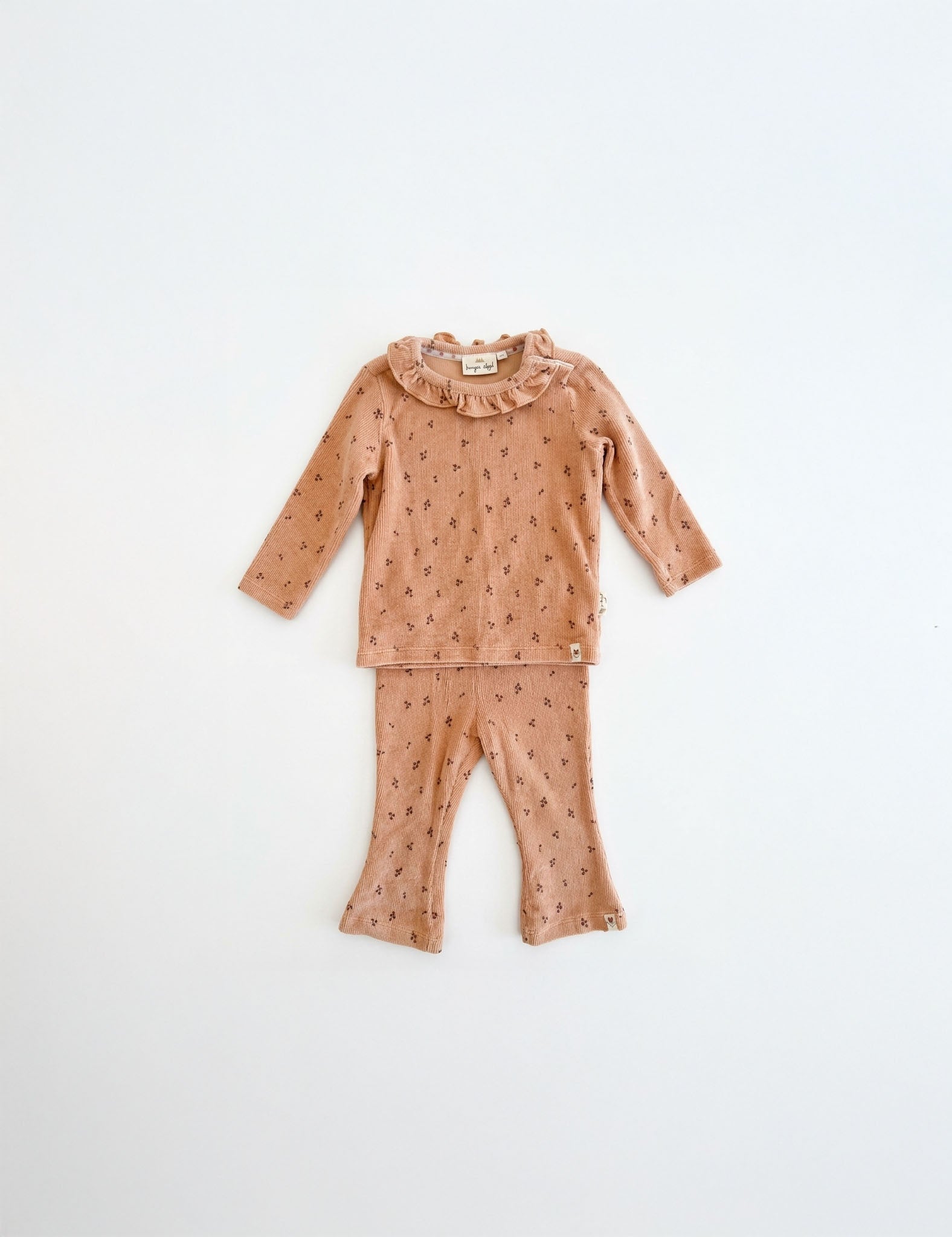Conjunto de bebé menina pré-usado: camisola com gola volante e calças estampadas